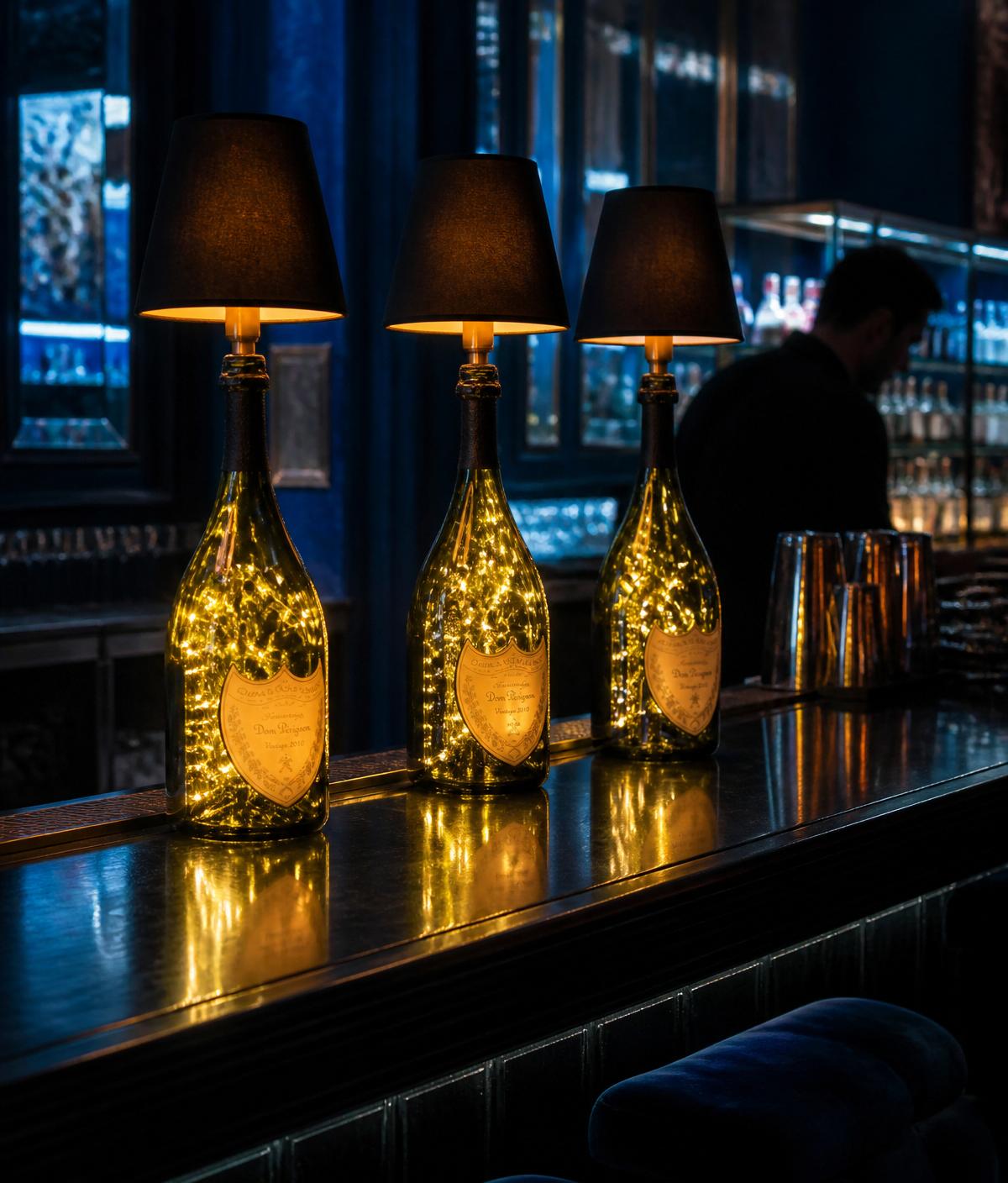 Three bottle lamps illuminating a luxury bar